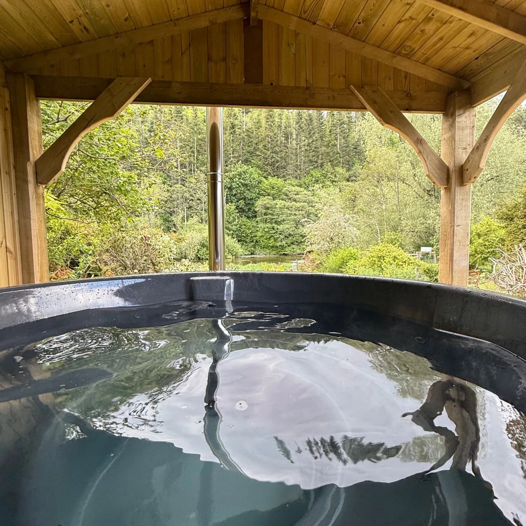 Covered wood-fired hot tub