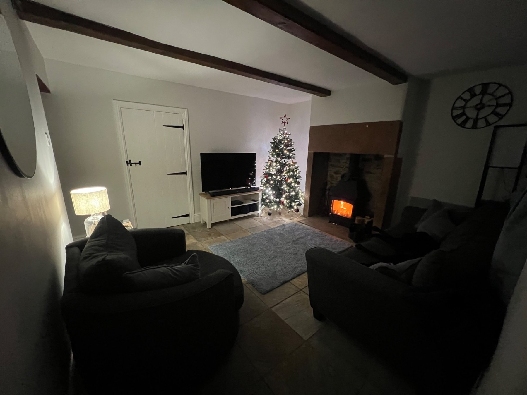 Living room with the stove lit in winter